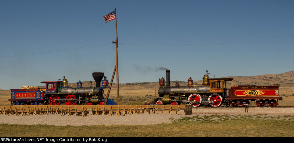 Jupiter and UP 119 pose with cow catchers nearly touching at the spot where the last spike was driven in America's first transcontinental railroad